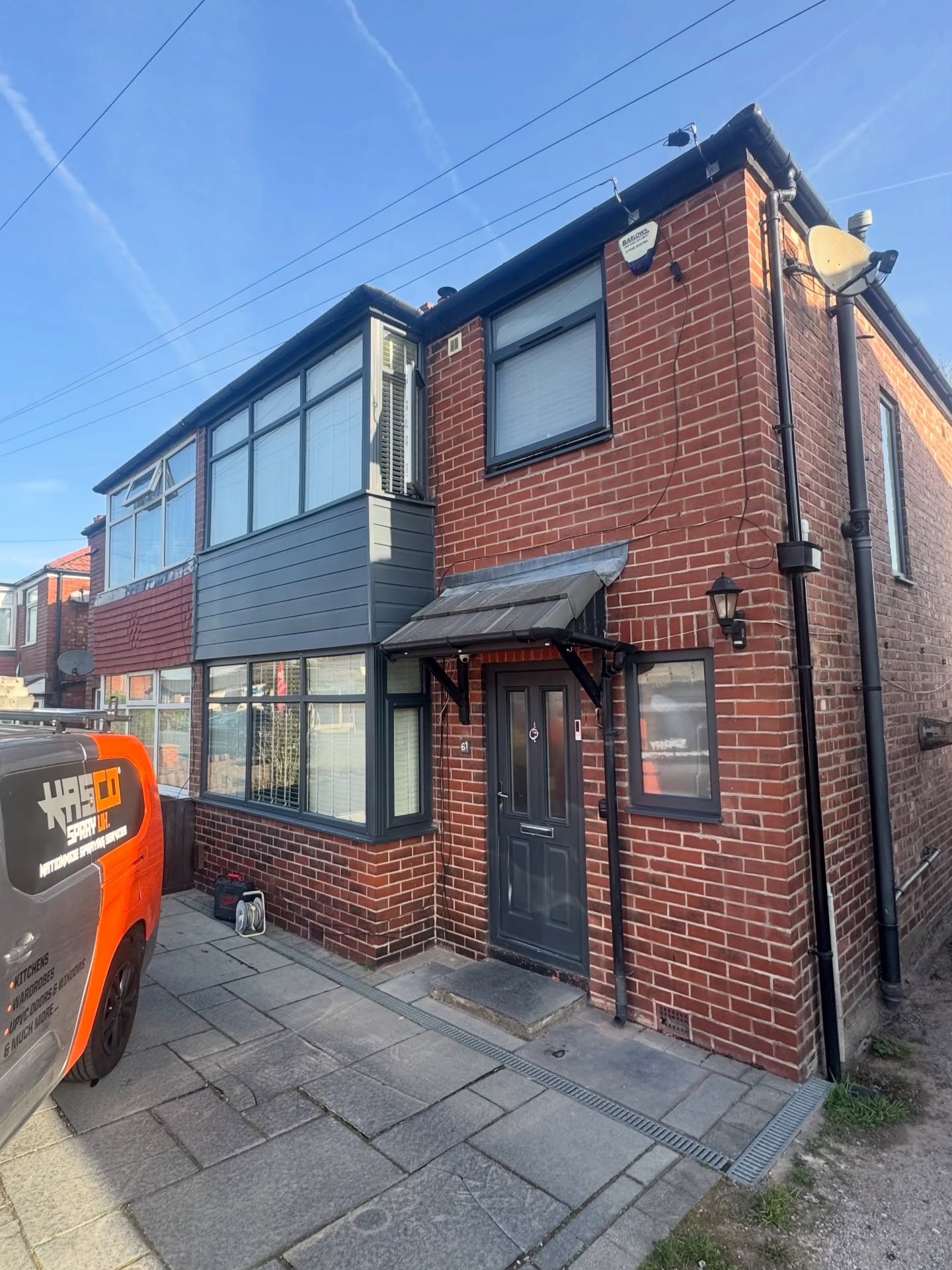 Freshly sprayed UPVC windows and doors in graphite grey