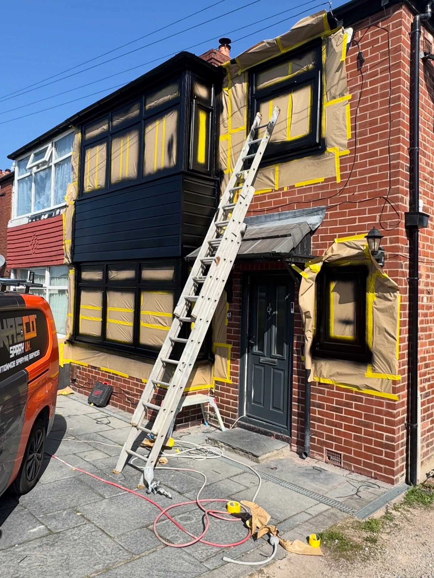 Property masked and prepped for spraying